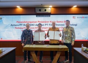 Penandatanganan Perjanjian Kerja Sama Antara Bank DKI dan PT Fidac Inovasi Teknologi (Fidac) tentang Penyaluran Kredit Multi Guna dengan Mekanisme Channeling melalui Peer to Peer Platform” yang ditandatangani oleh Direktur Ritel & Syariah Bank DKI, Henky Oktavianus serta Direktur PT Fidac Inovasi Teknologi, Harry Fardan Zaini/Foto: Bank DKI