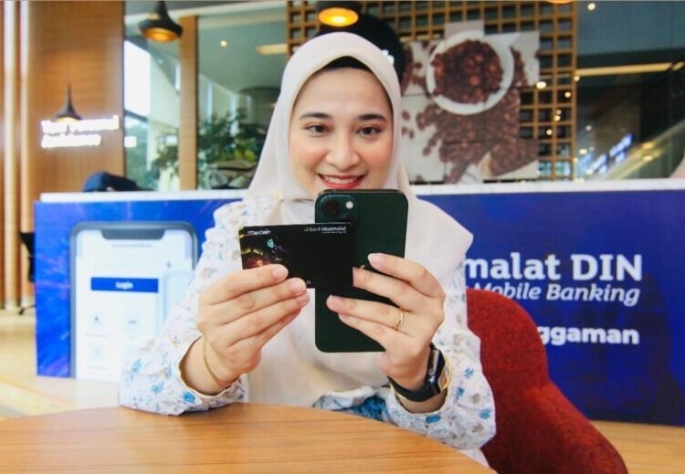 PT Bank Muamalat Indonesia Tbk mencatat transaksi digital mobile banking miliknya yakni Muamalat Digital Islamic Network (MDIN) tumbuh 13,04 persen (year-on-year/yoy) menjadi 2,6 juta transaksi pada Juli 2025